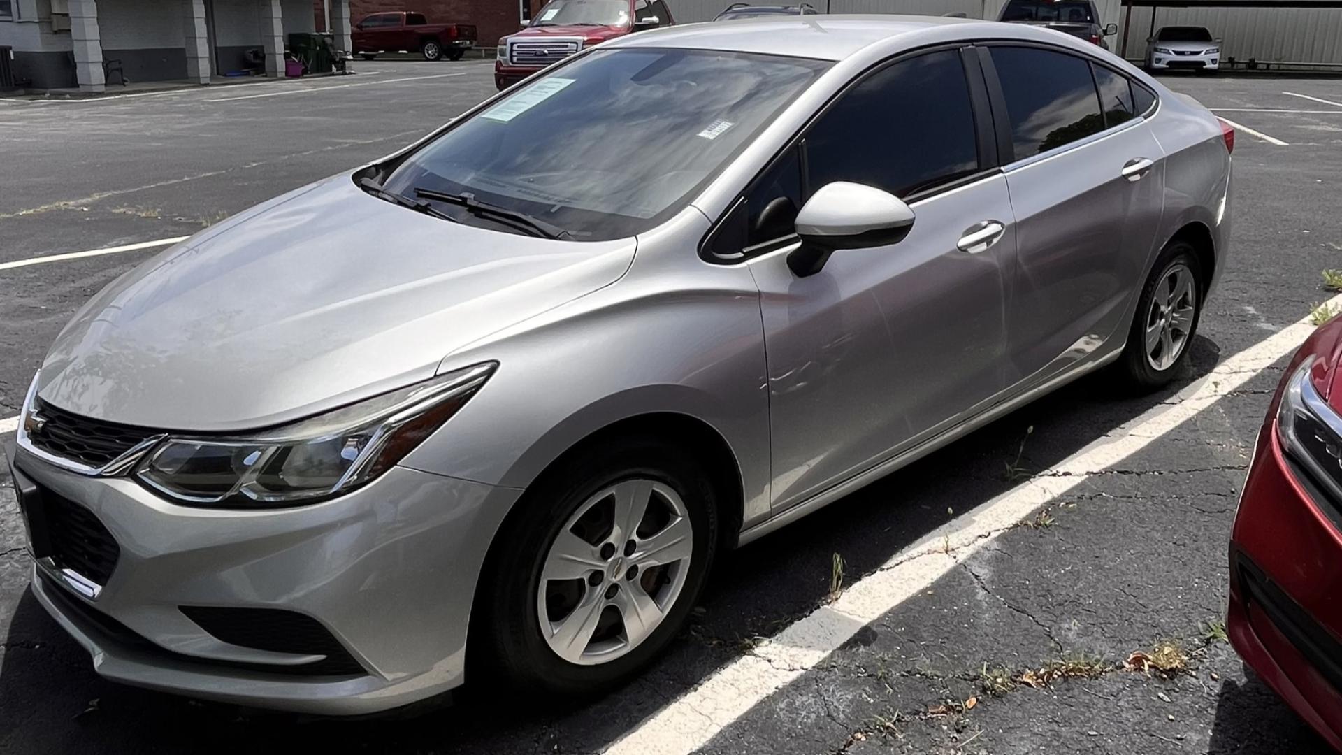 2016 Chevrolet Cruze LS Auto (1G1BC5SM3G7) with an 1.4L L4 DOHC 16V TURBO engine, 6A transmission, located at 945 E. Jefferson Blvd, Dallas, TX, 75203, (214) 943-7777, 32.752514, -96.811630 - Photo#0